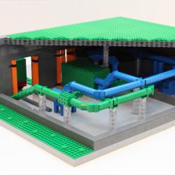 Modell av lego visualiserar Avfallshantering av Envac